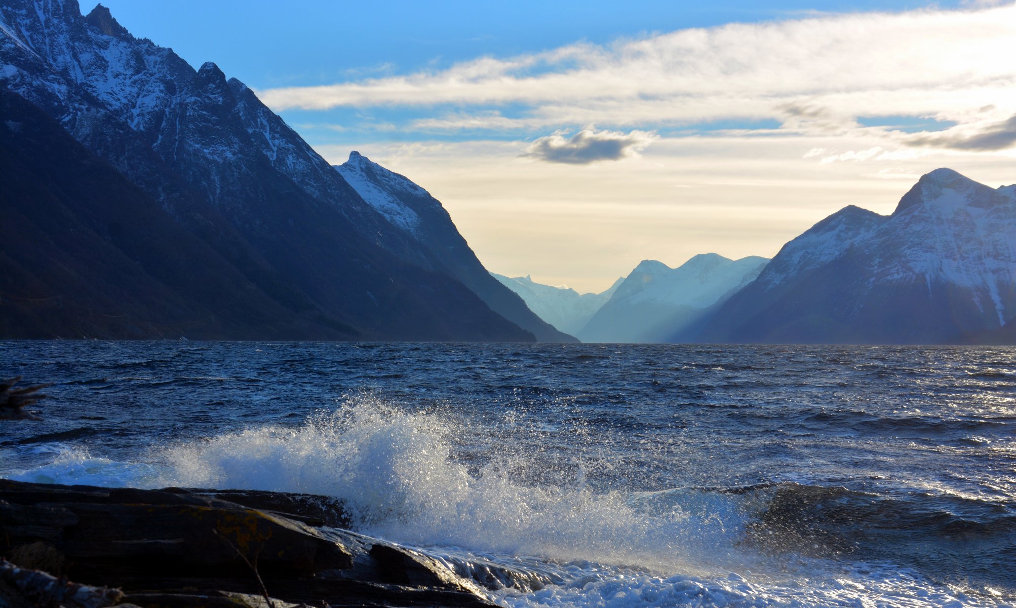 landscape sea waves spray mountain sky cloud