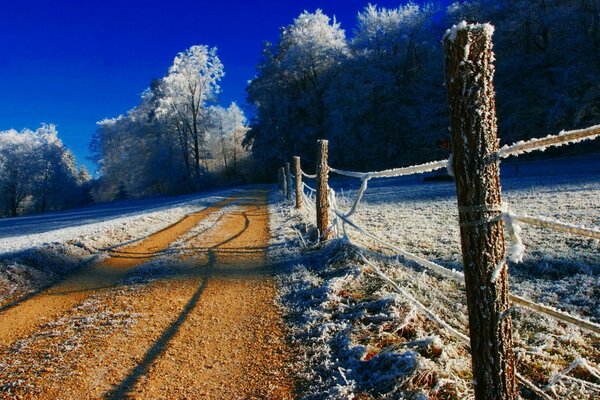 The road is covered with frost in the morning