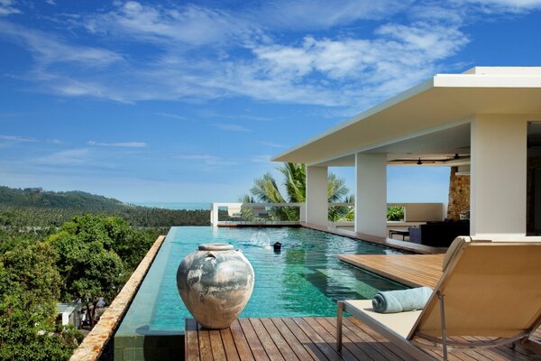 Relaxing by the pool on a bright summer day