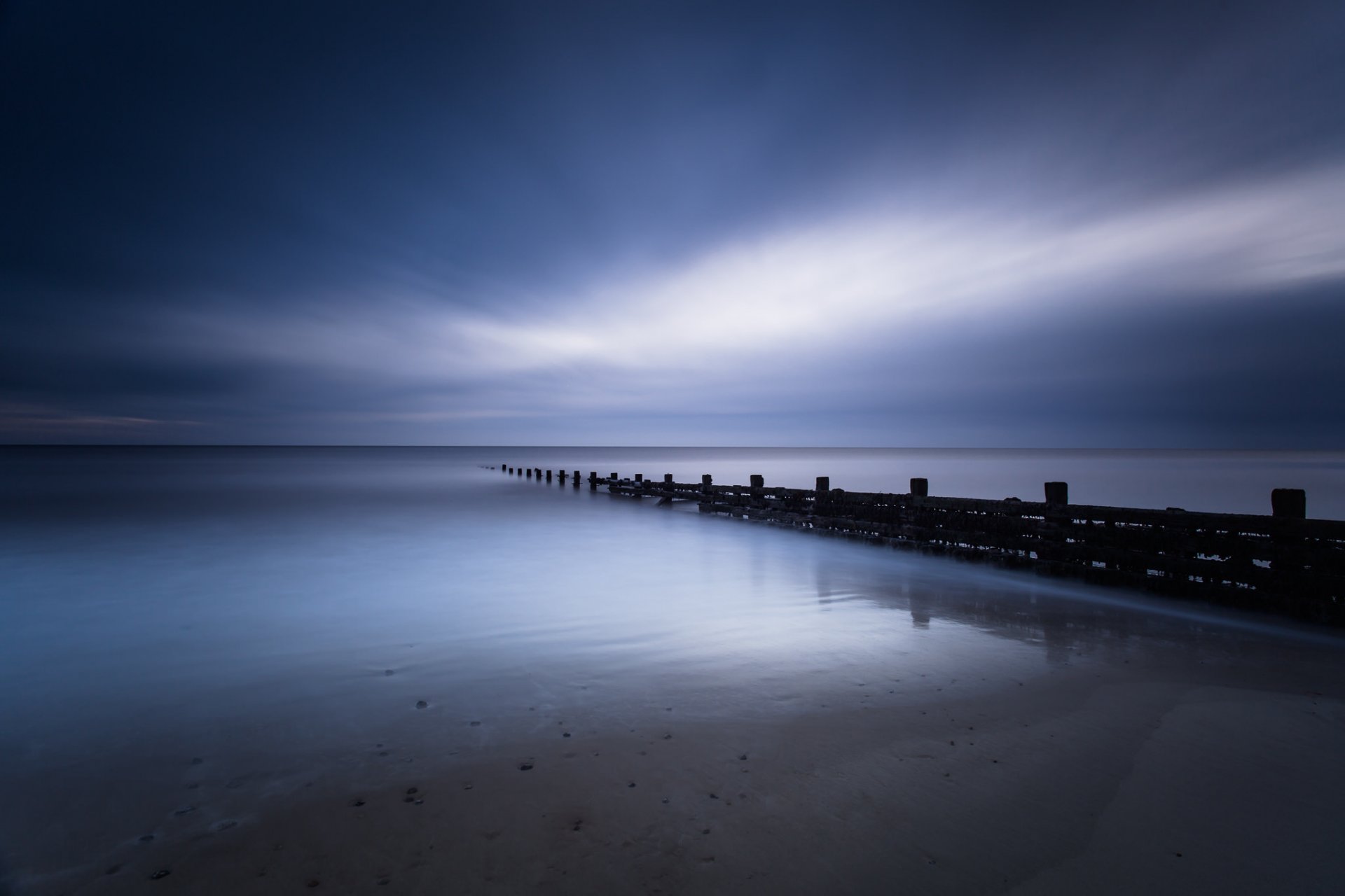 united kingdom england north norfolk sea calm beach night blue sky