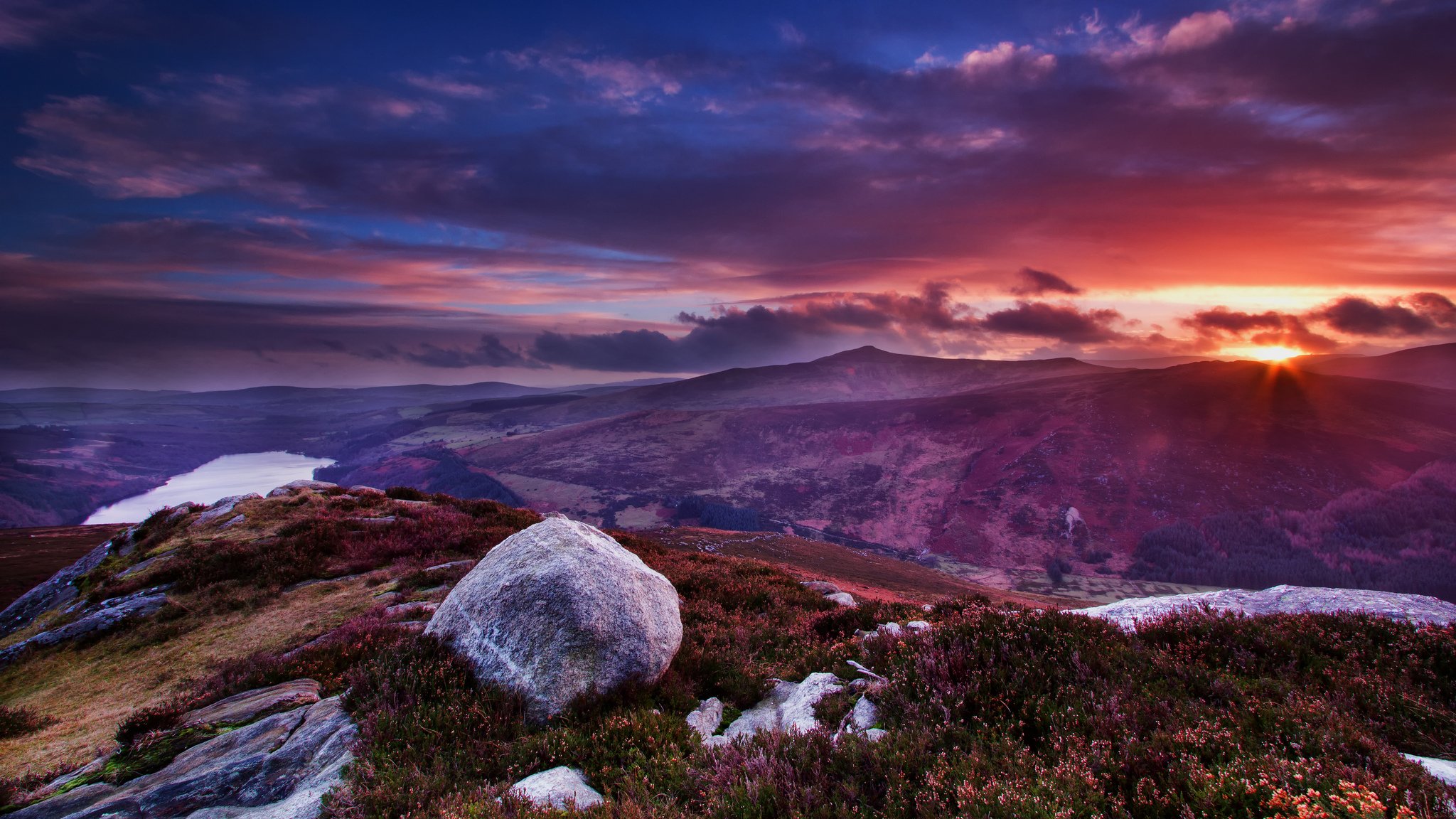 ireland mountain summit landscape stones flower grass clouds sun sunset view