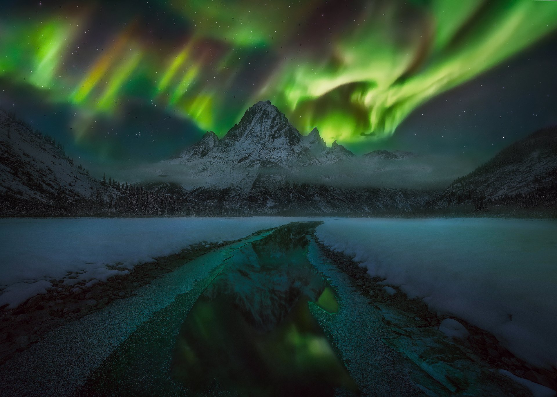 winter night sky star northern lights mountain clouds forest snow water reflection