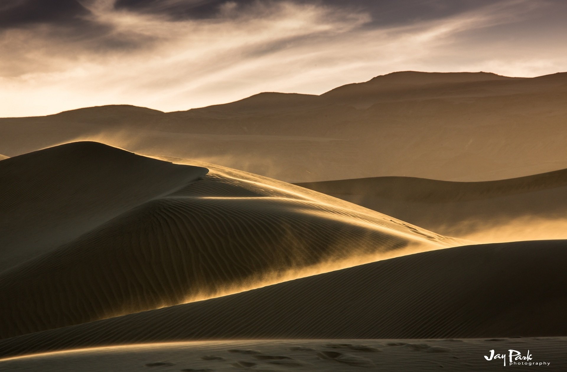 desert sand dunes dune wind dust storm clouds sky landscape