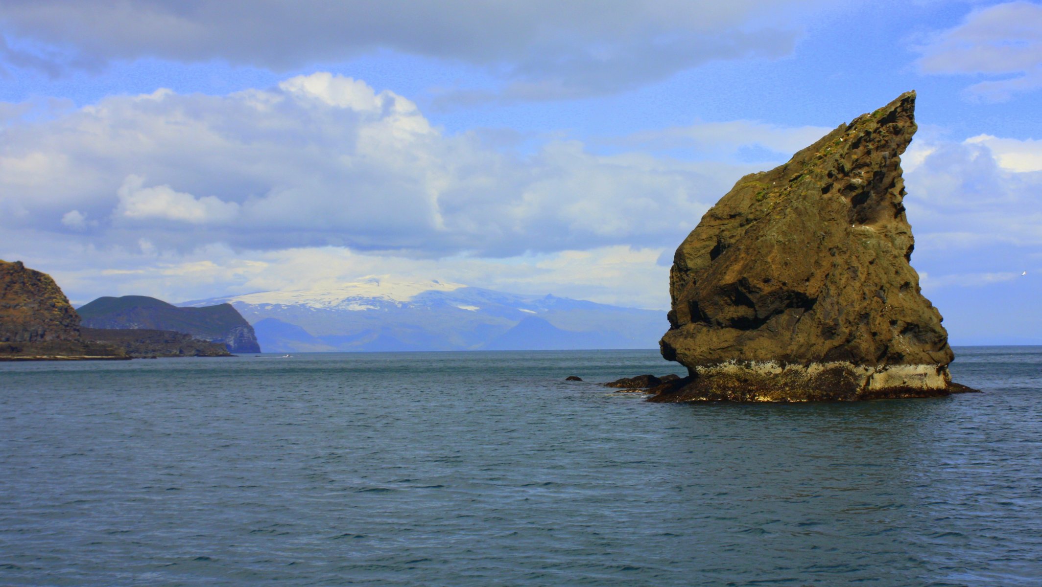 meer rock ufer berge gipfel schnee himmel wolken