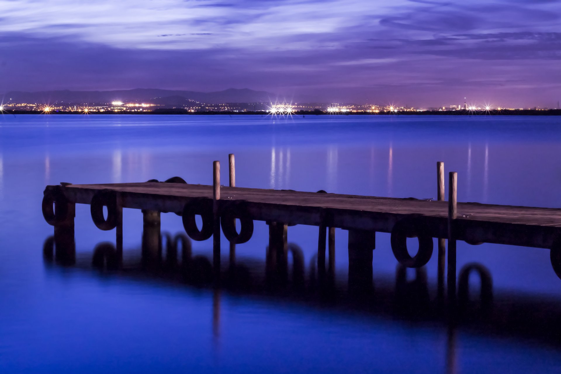 spanien hafen meer küste brücke lichter beleuchtung nacht blau lila himmel