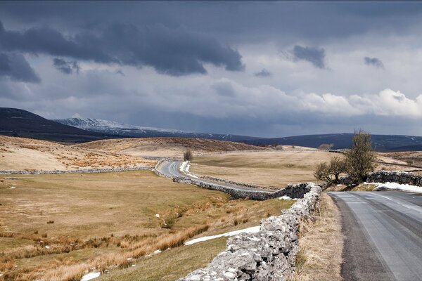 A road in England. Natural landscape