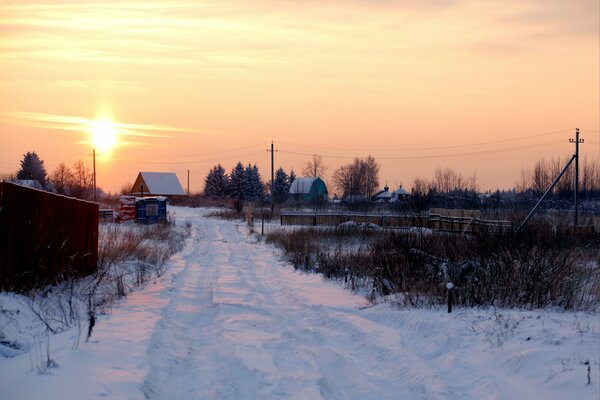 Sunrise in winter in a country village