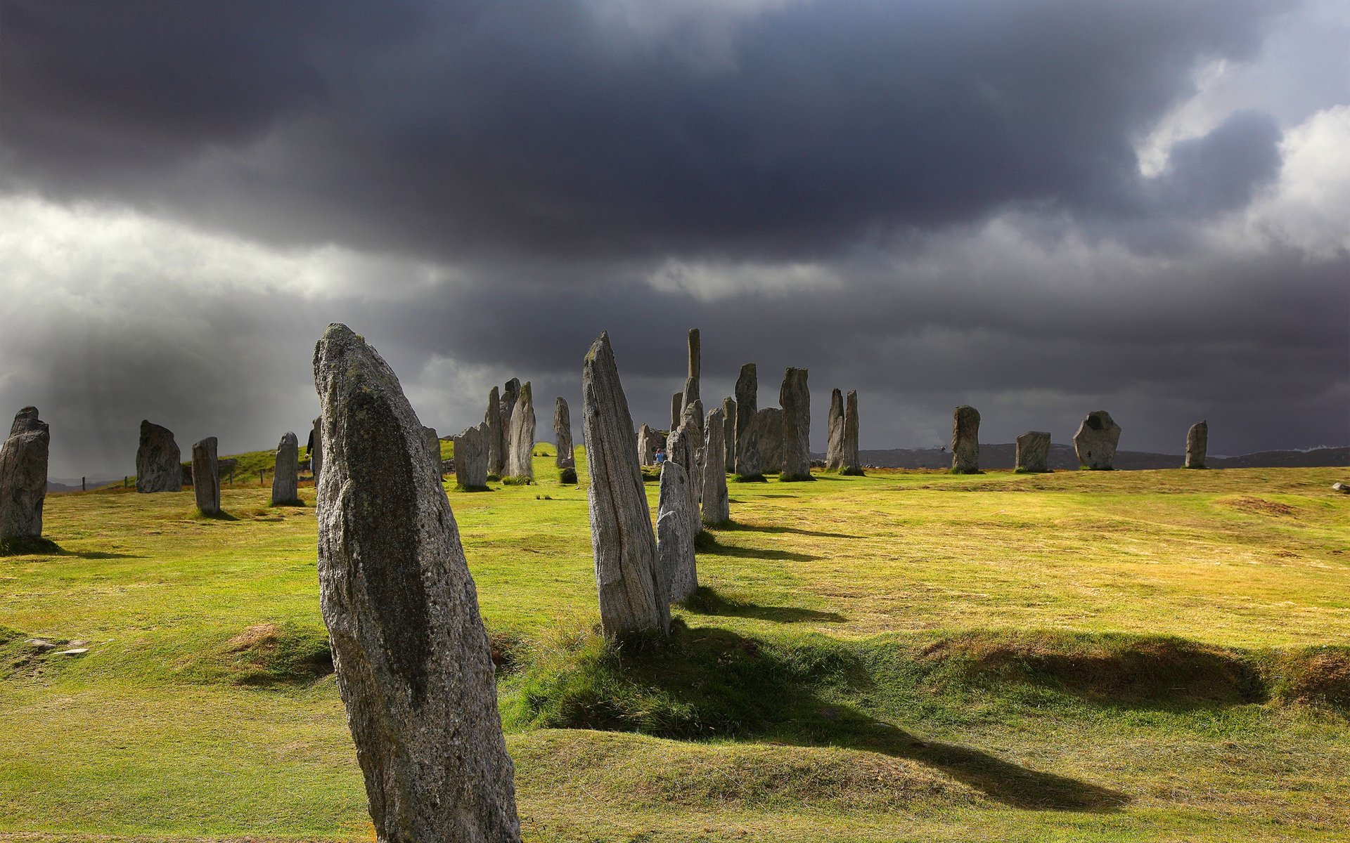 tones megaliths boulders grass cloud