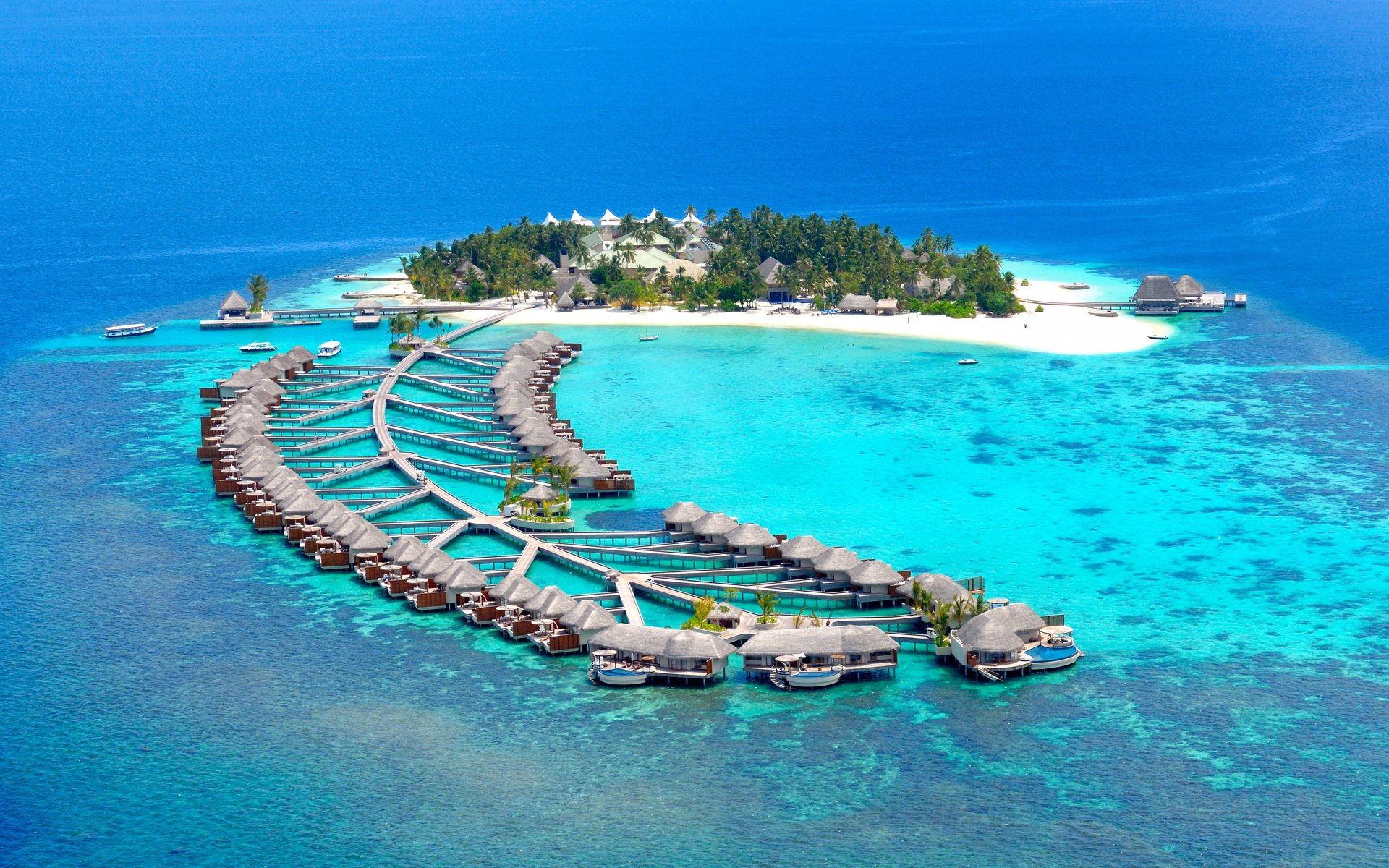 maldives island resort bungalow pier beach reef