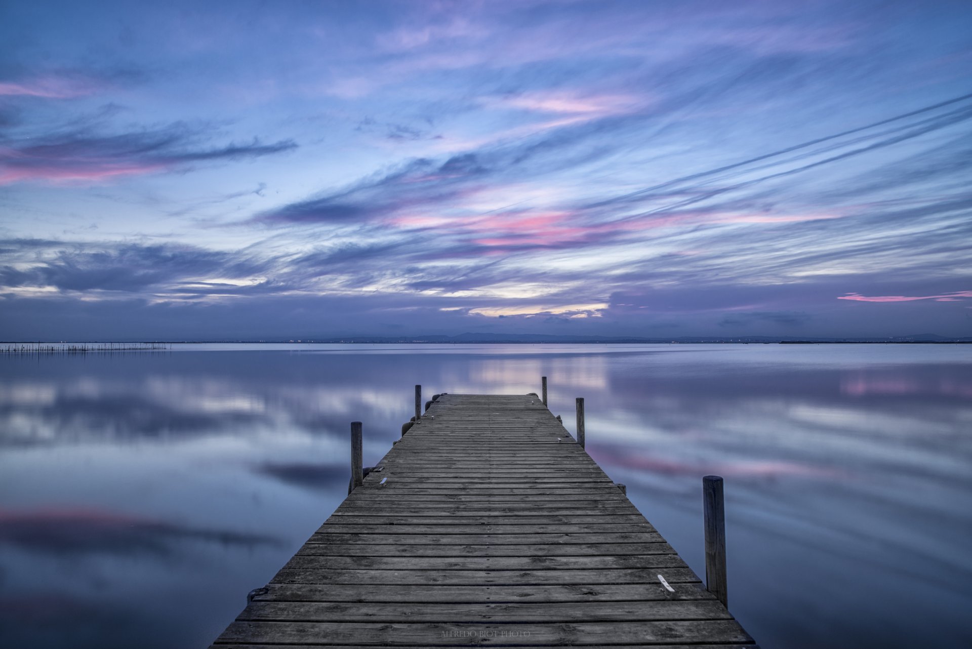 españa mar agua superficie madera puente noche cielo nubes reflexión