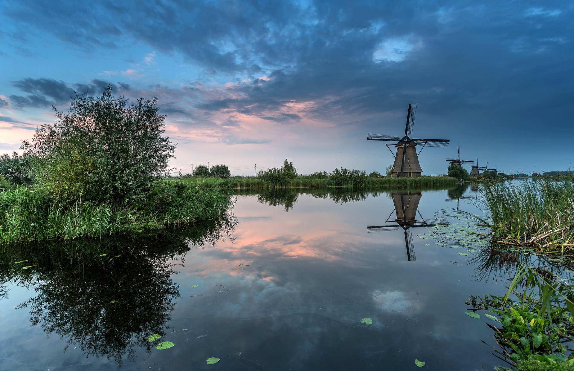 the netherlands sky clouds channel windmill