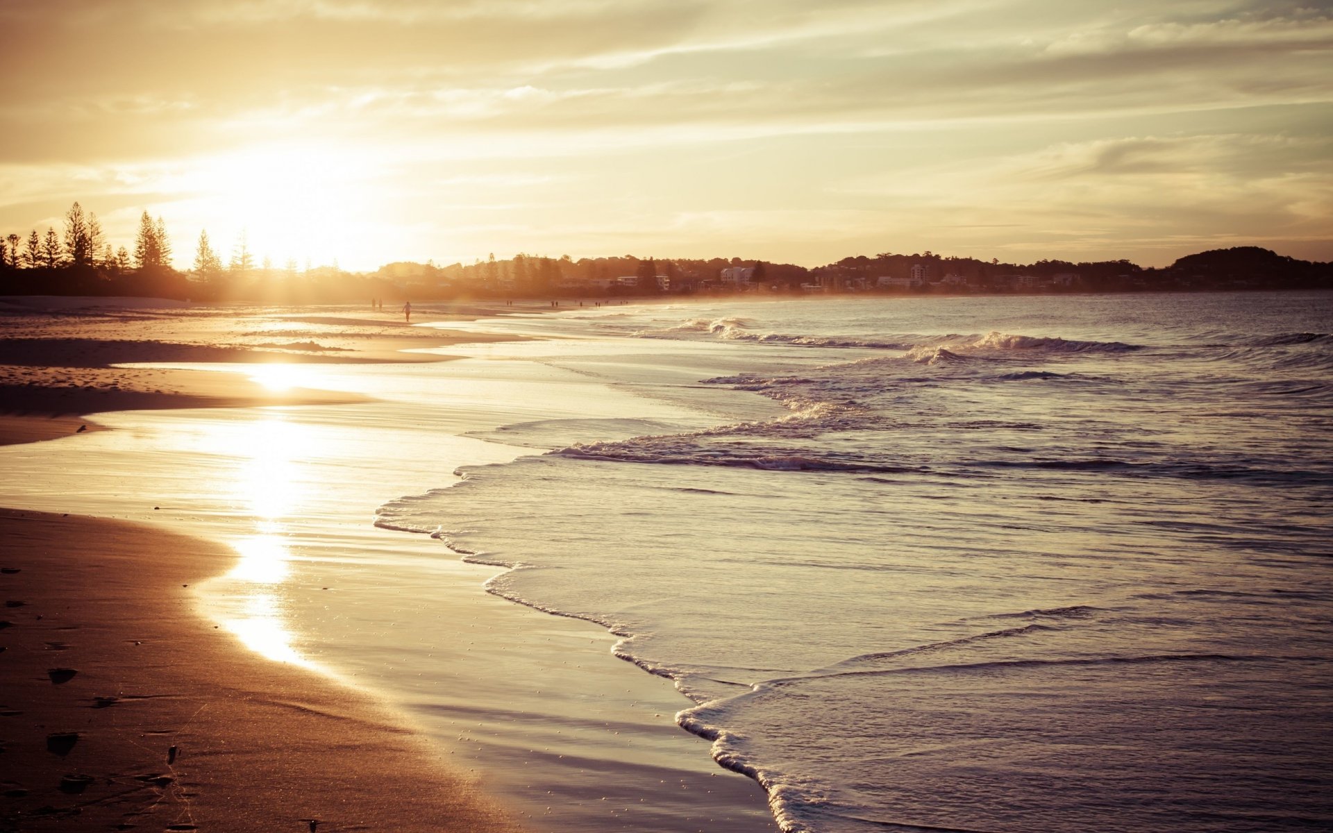 beach sand waves sky sun light