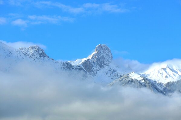 Mountains towering above the clouds