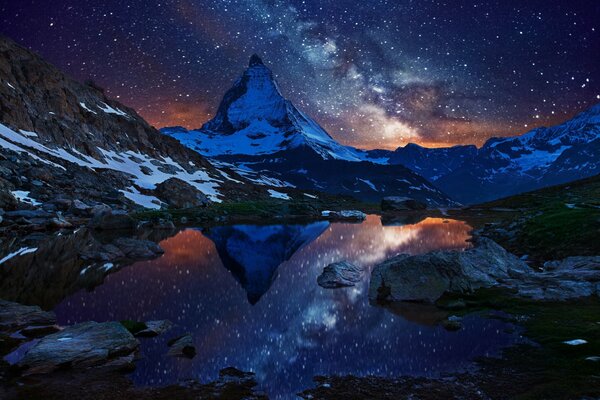 Stars on the background of mountains and lakes