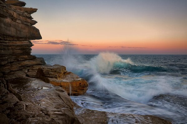 Tramonto mare spruzzi d onda