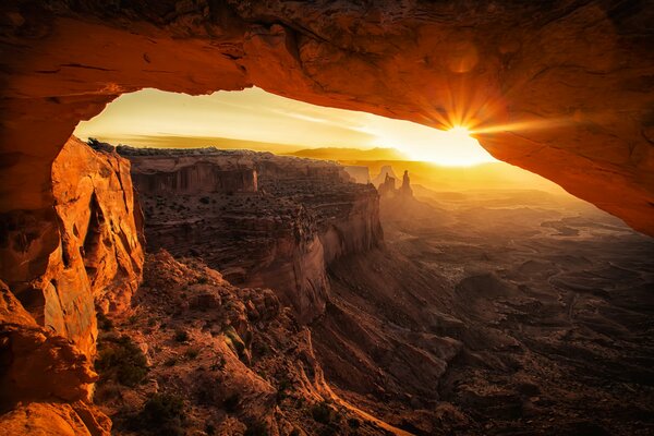 Canyon at sunset in the rays of the sun