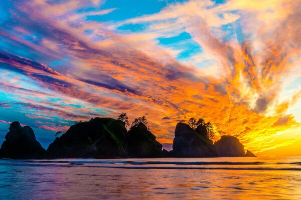 Sunset on the island beyond the mountains