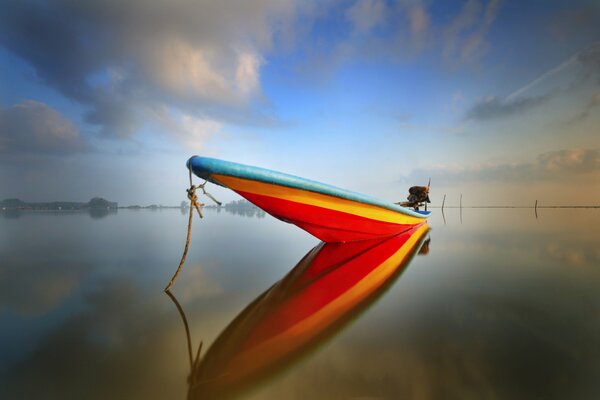 Complete calm and a lonely boat