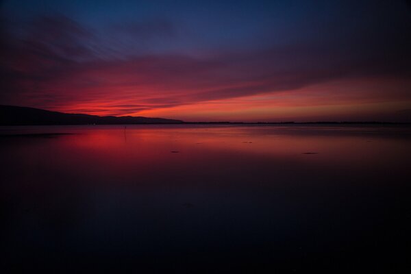 Lagoon in Tuscany against the glow