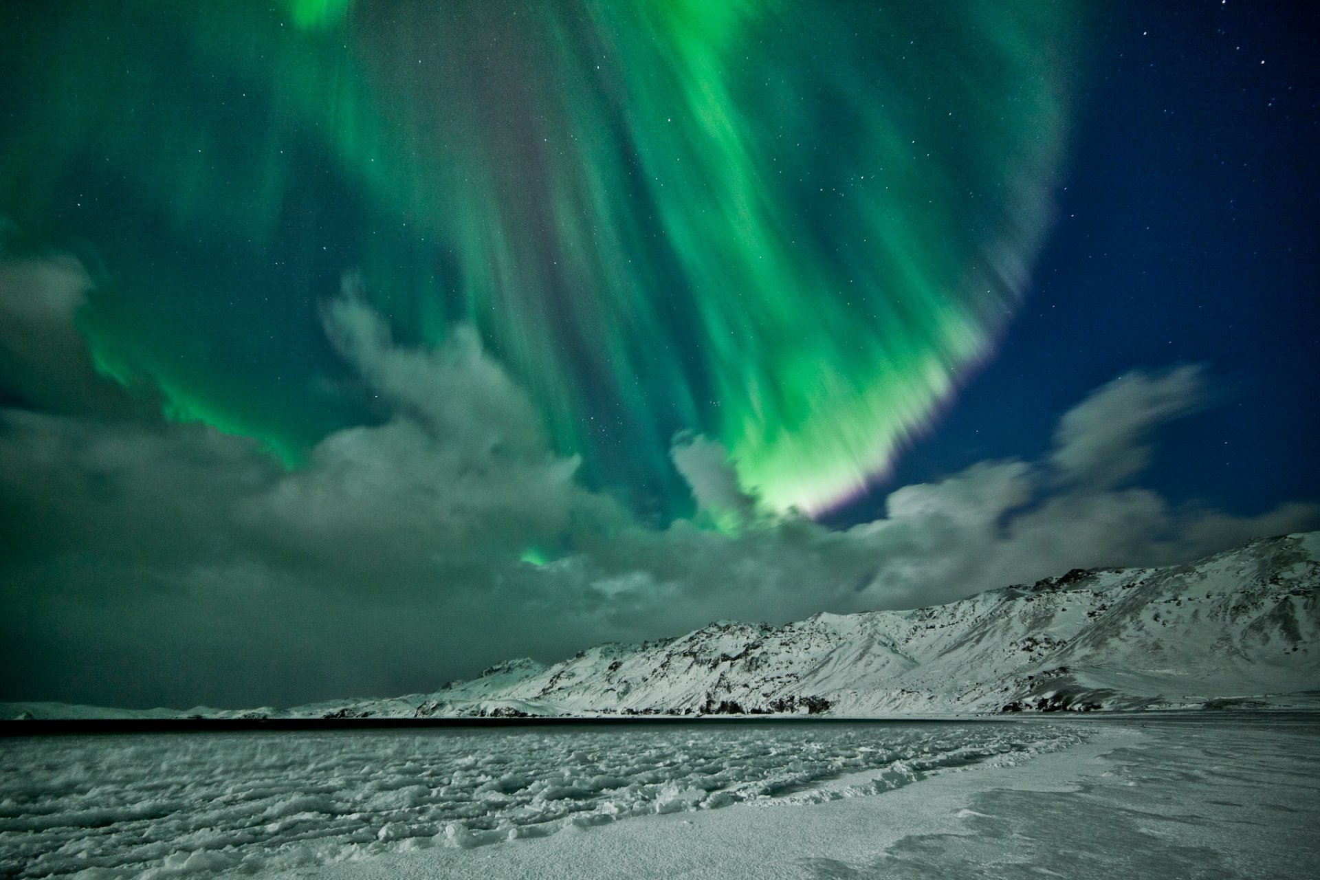 aurora borealis northern lights sky star mountain winter snow