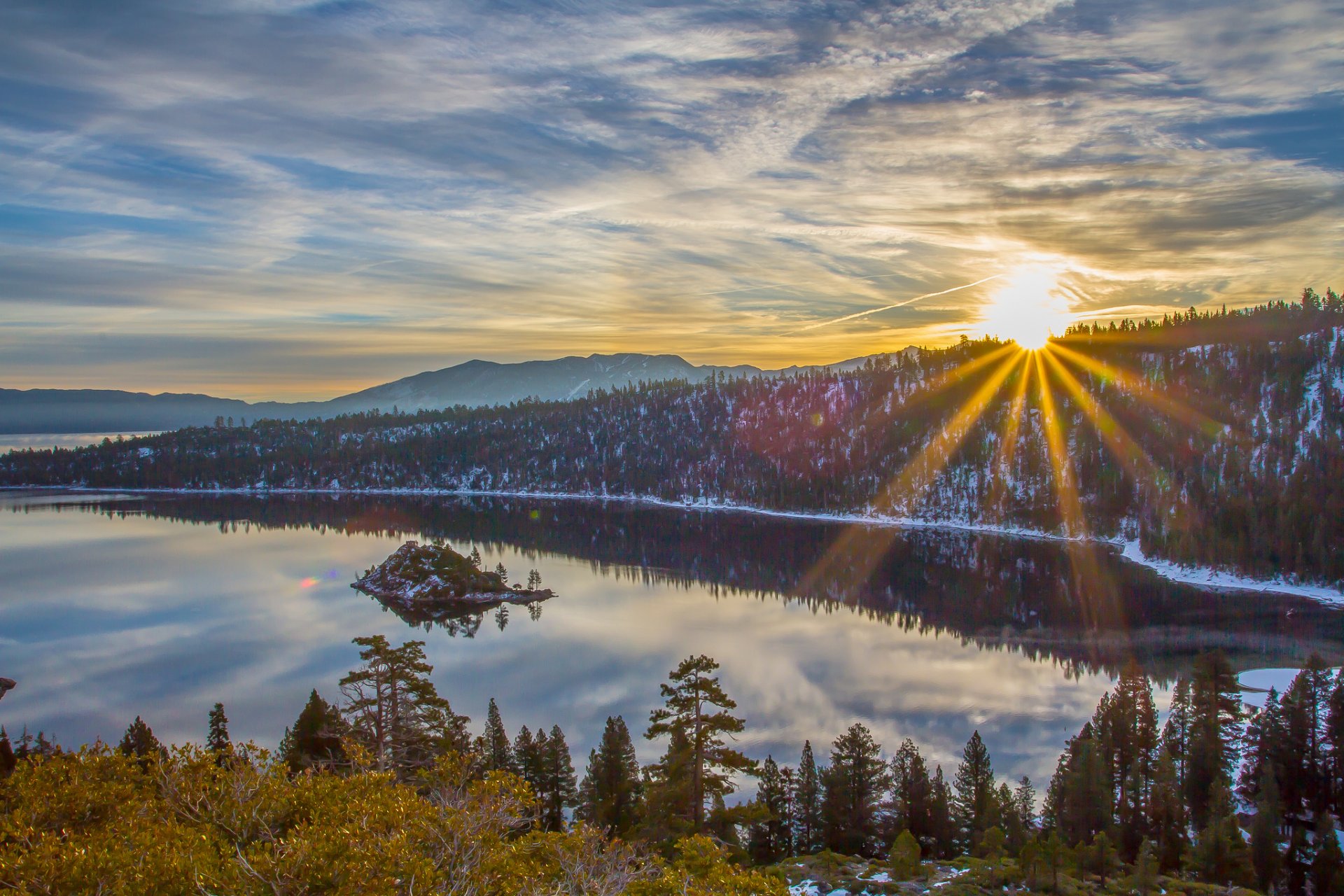 mountain forest snow lake island sun rays morning sunrise