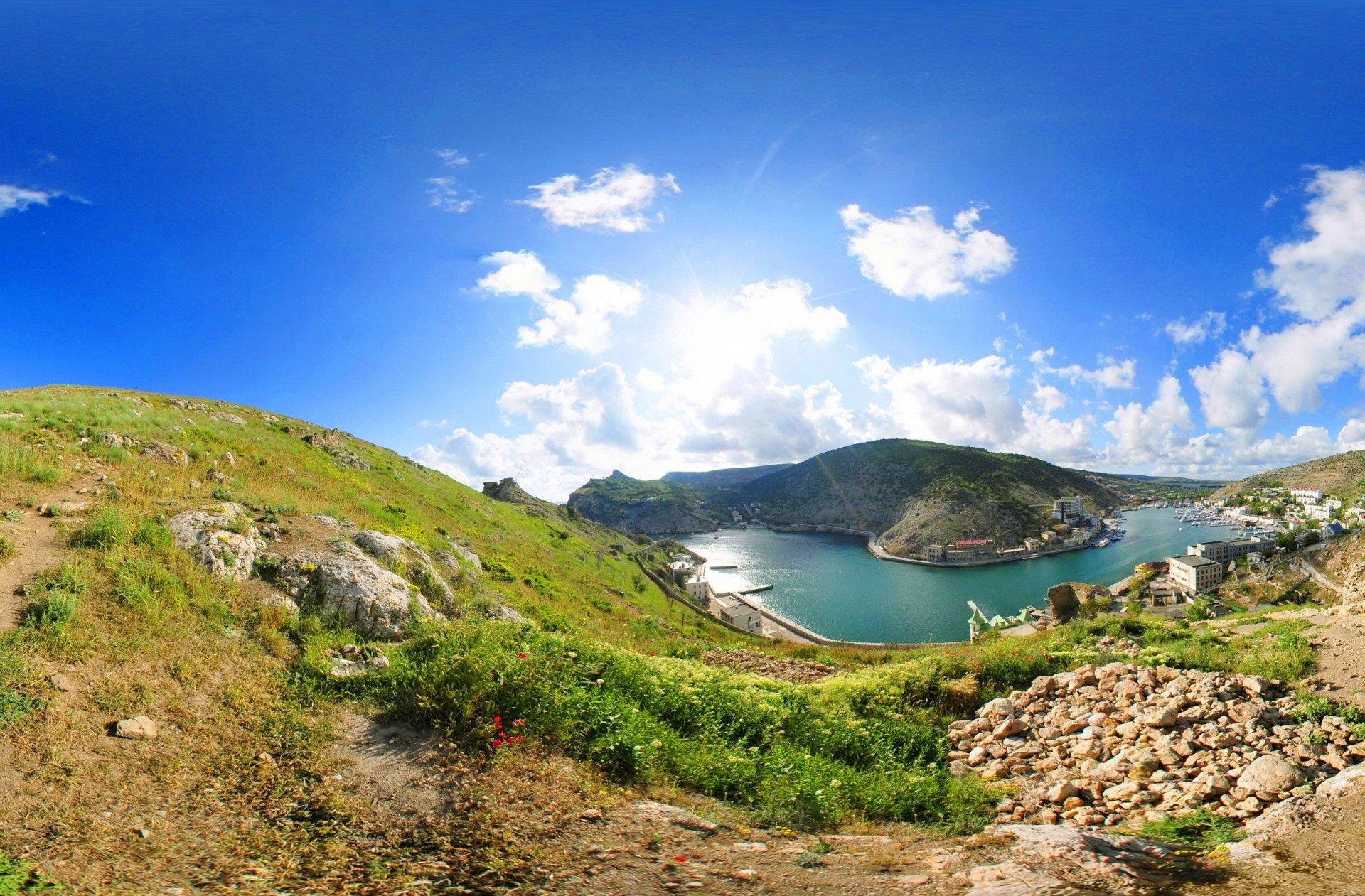 ukraine crimea balaclava sea bay sky clouds grass stones house nature