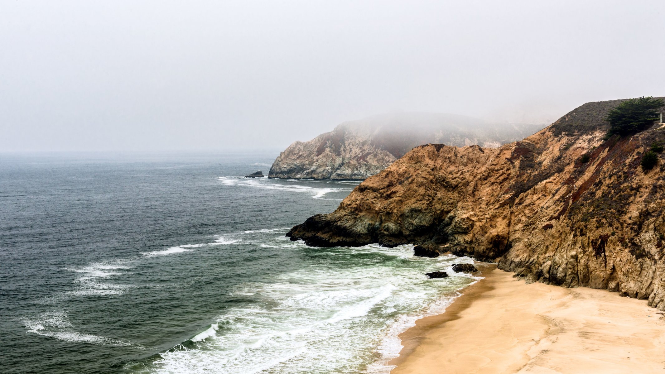 california coast rocks ocean water sand beach usa mountain fog