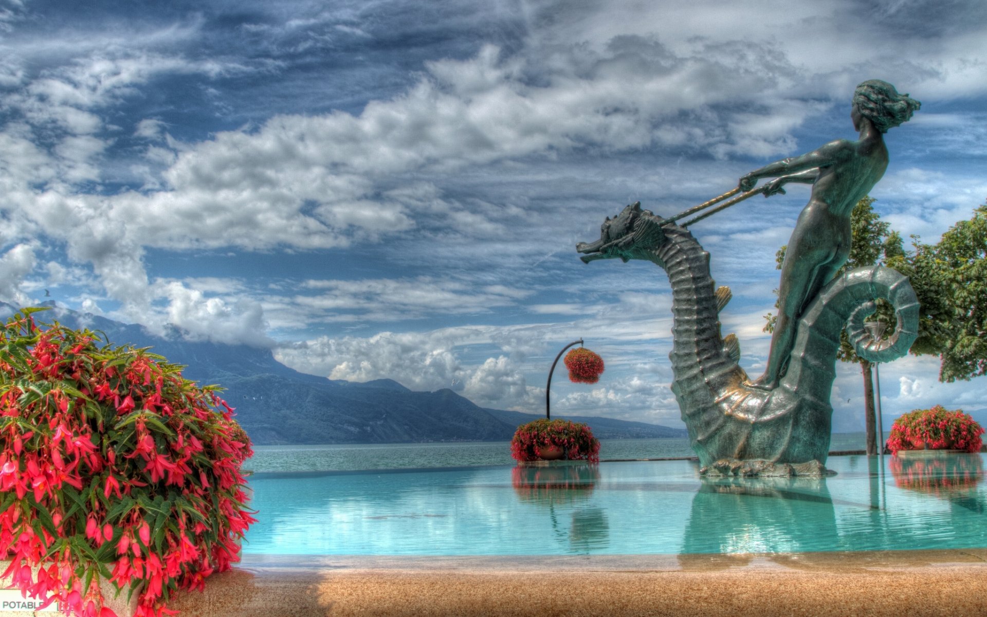 vevey schweiz genfer see blumen brunnen skulptur landschaft