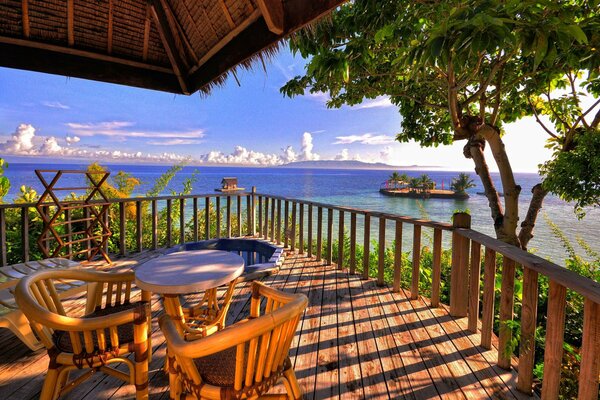 Veranda with sea and mountain views