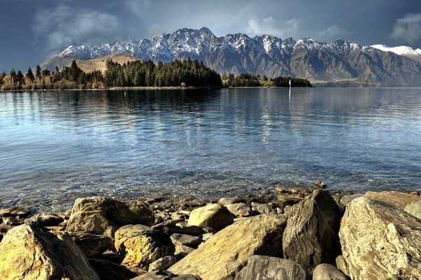 Reflection of mountains and rocks in water