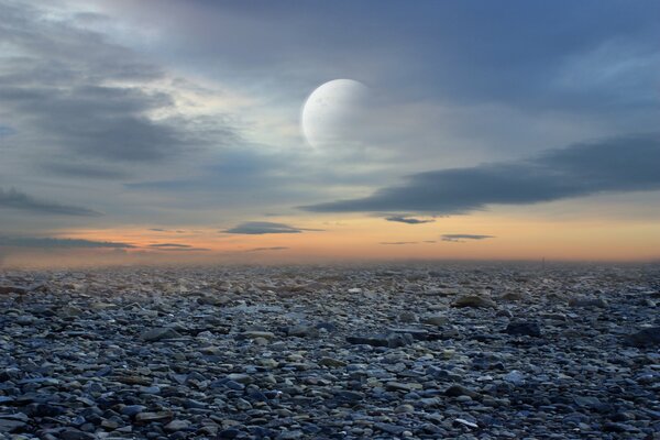 Fantastic landscape with rocks and a planet