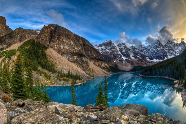 The blue lake in which the mountains are reflected